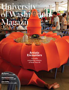 A cover of a magazine featuring a woman in a giant orange tube that wraps around a restaurant table