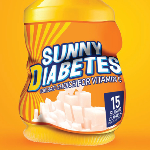 A damaged container of juice with a label reading "Sunny Diabetes, 100% bad choice for Vitamin C, 15 sugar cubes per serving"