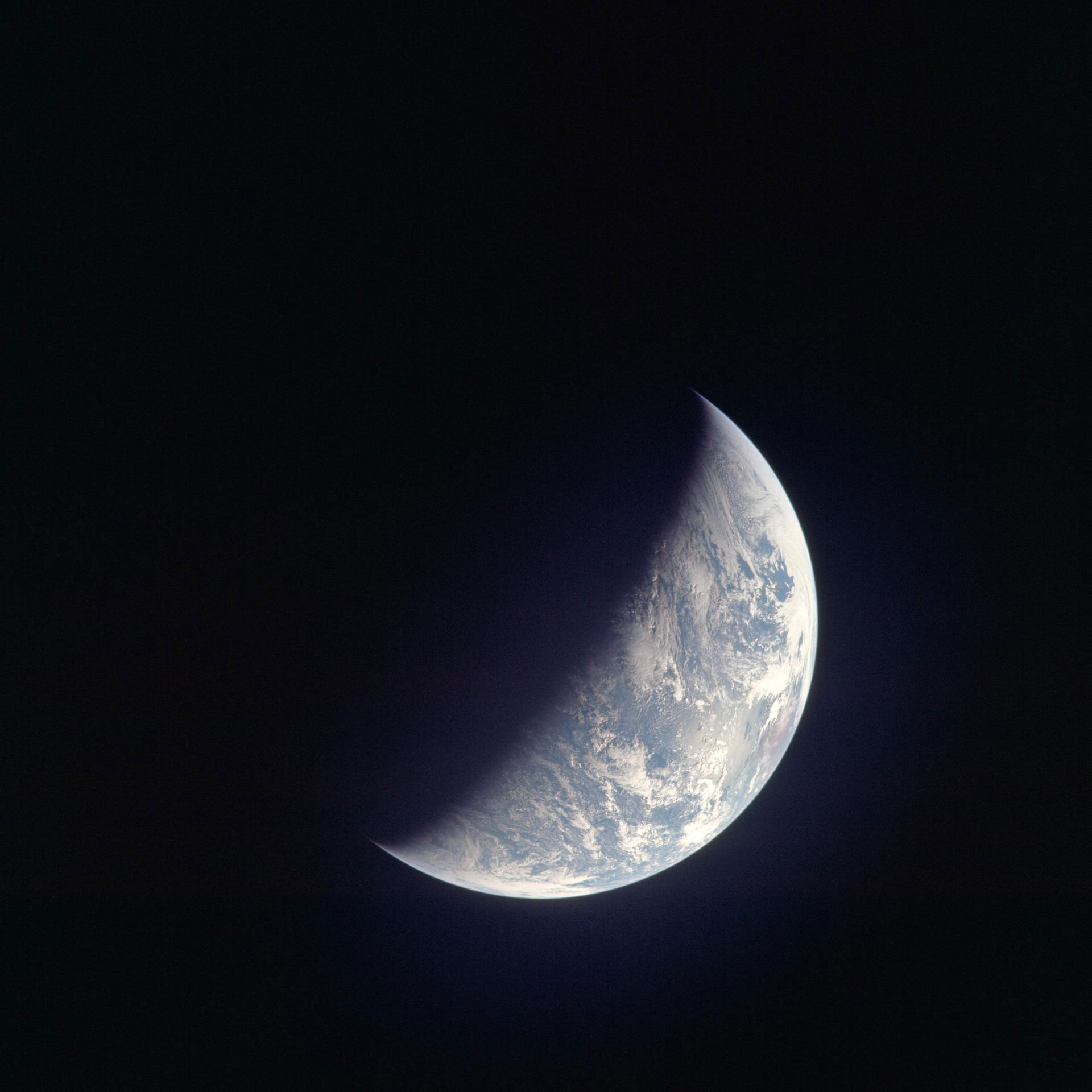 A crescent shape of Earth from space