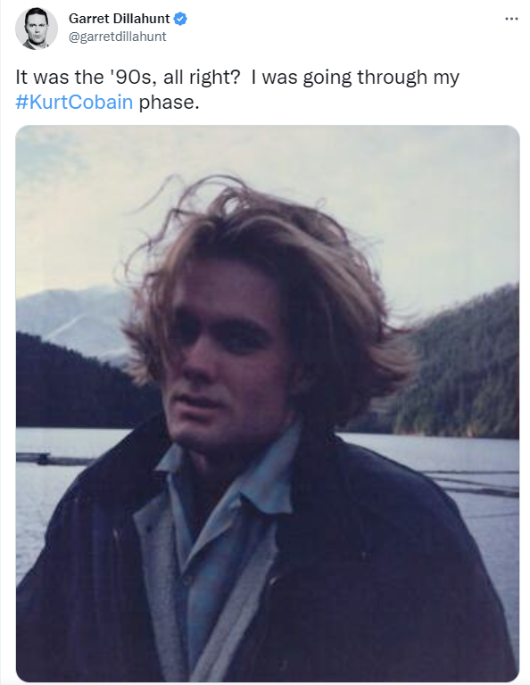 A film photo of a man with messy long blonde hair in front of the Puget Sound, captioned, "It was the '90s, all right? I was going through my #KurtCobain phase."