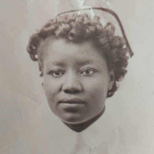 Sepia toned film headshot of Rachel Suggs Pitts in a nursing uniform
