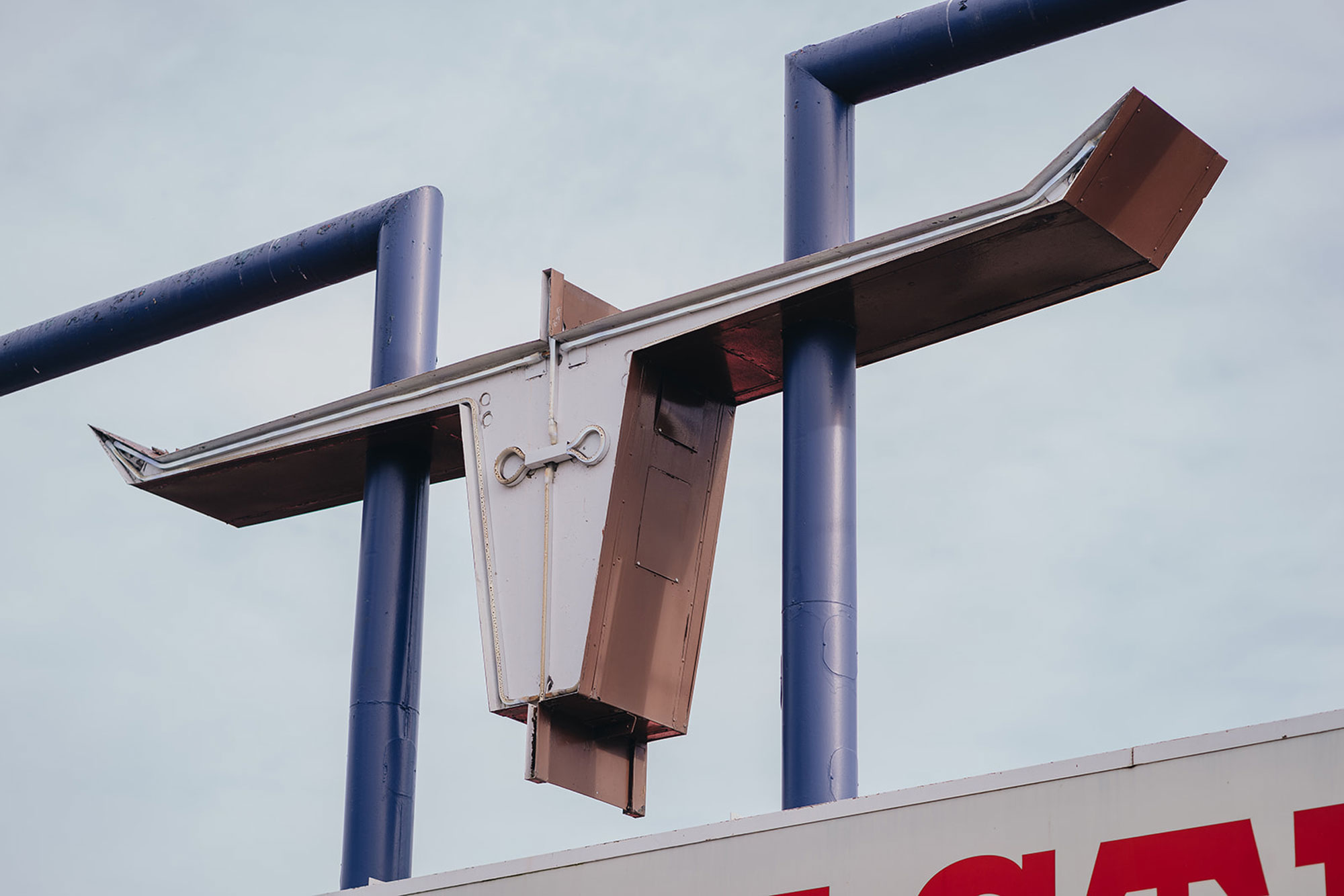 The iconic neon buffalo sign above Burgermaster