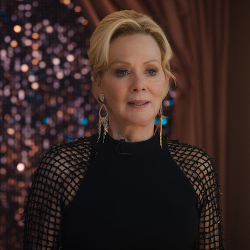 Jean Smart smiles on a talk show stage
