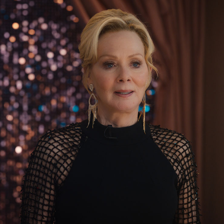 Jean Smart smiles on a talk show stage